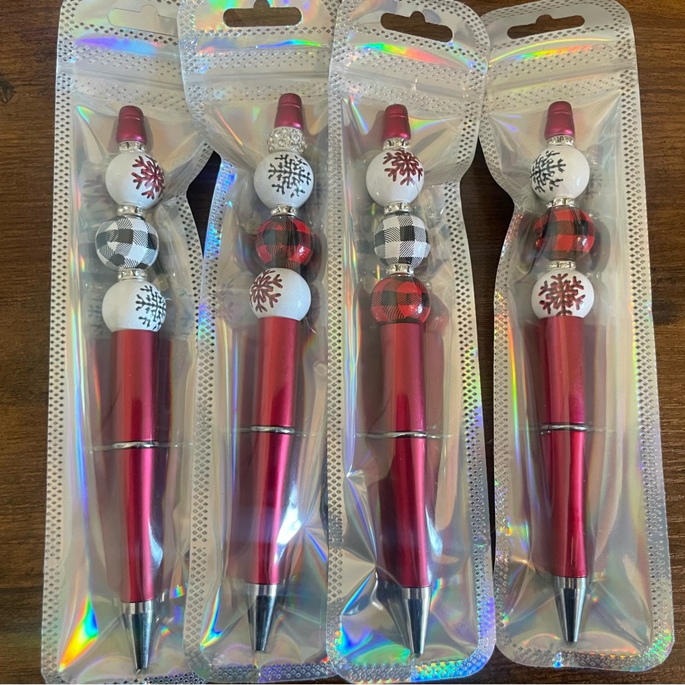 Hand beaded Christmas pens. Black/white/red.